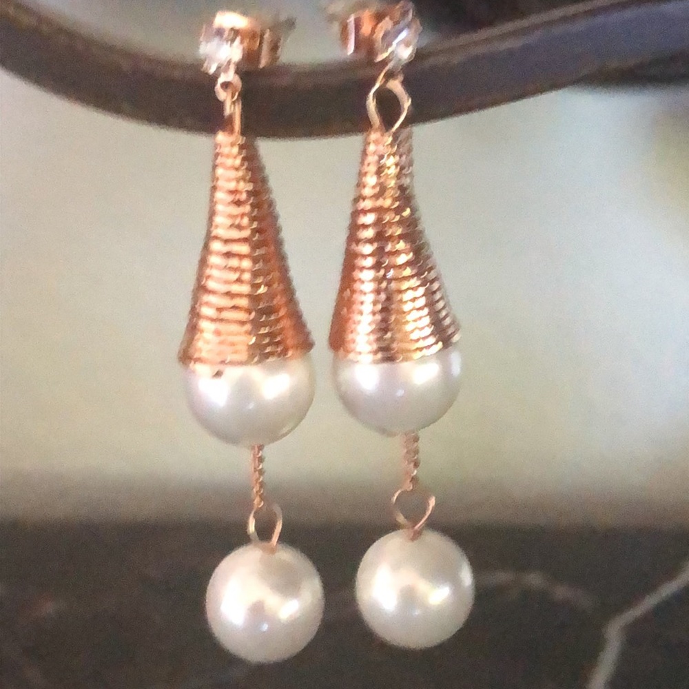 Gold plated pearl conical dangle earrings